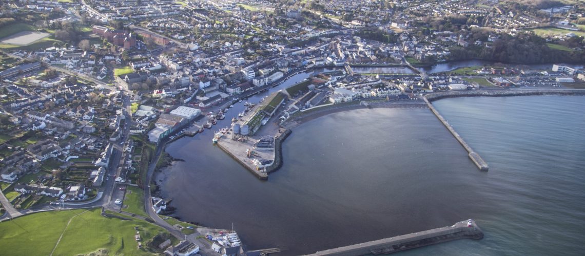 aerial-view-of-city-near-body-of-water-2603833